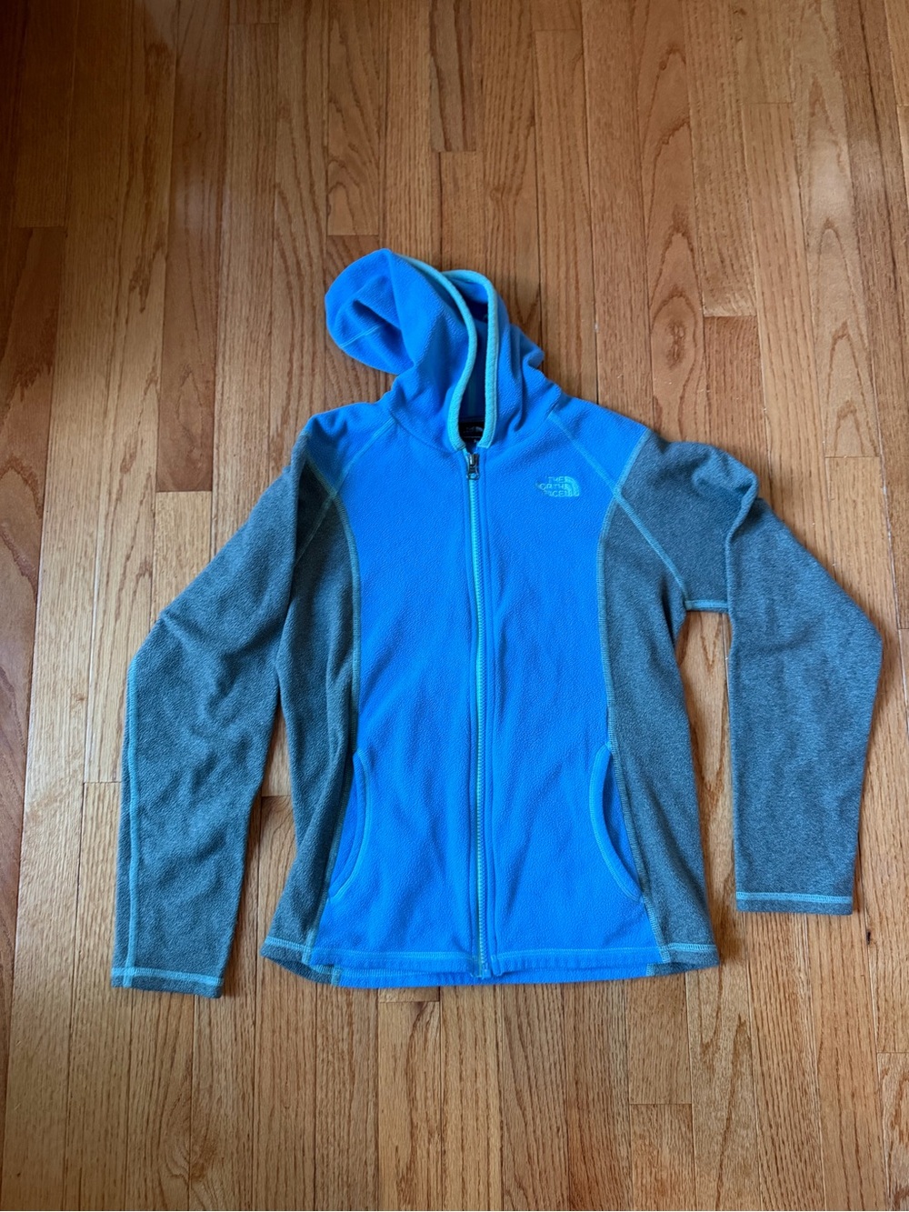 The North Face Blue Hooded Fleece Jacket with Gray Sleeves